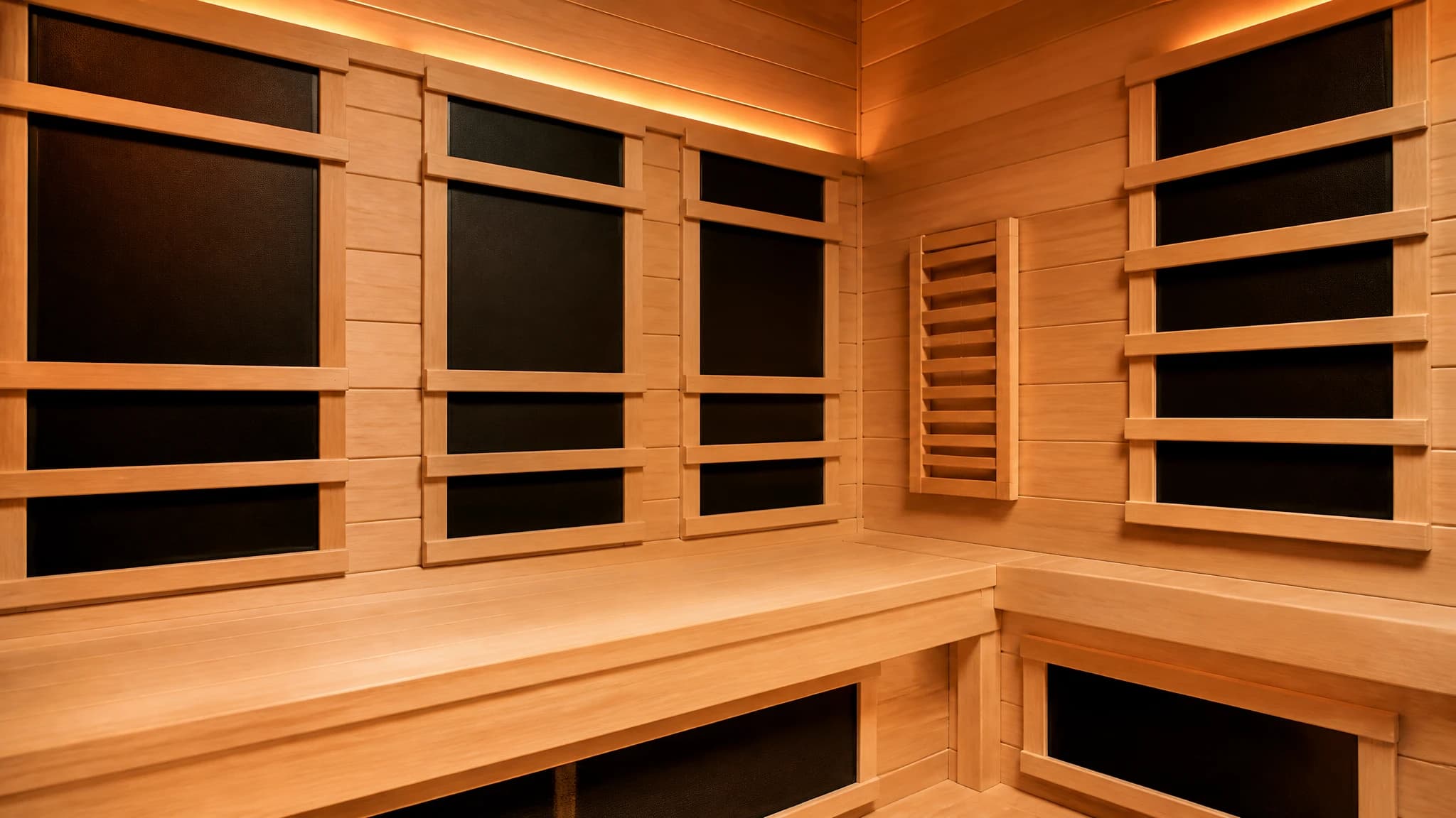 Interior view of an infrared sauna showing flat heating panels.