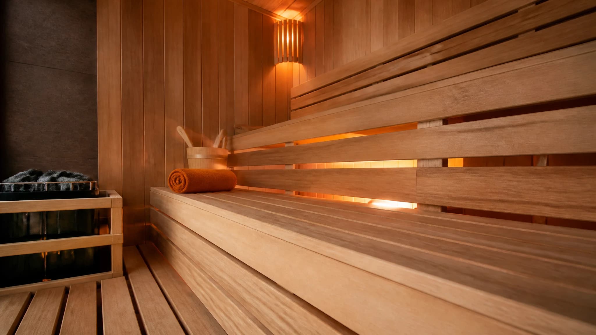 Tiered wooden benches inside a traditional sauna